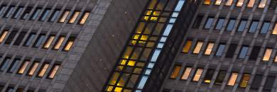 Building facade with illuminated windows